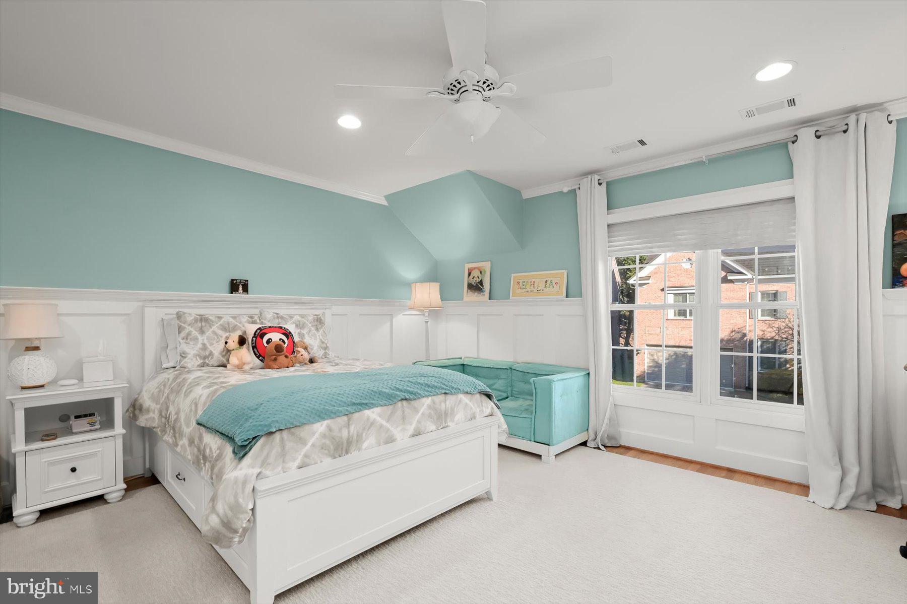 7828 Stable Way Potomac, MD 20854 - Photo 42 of 60 a bedroom with a bed and a large window