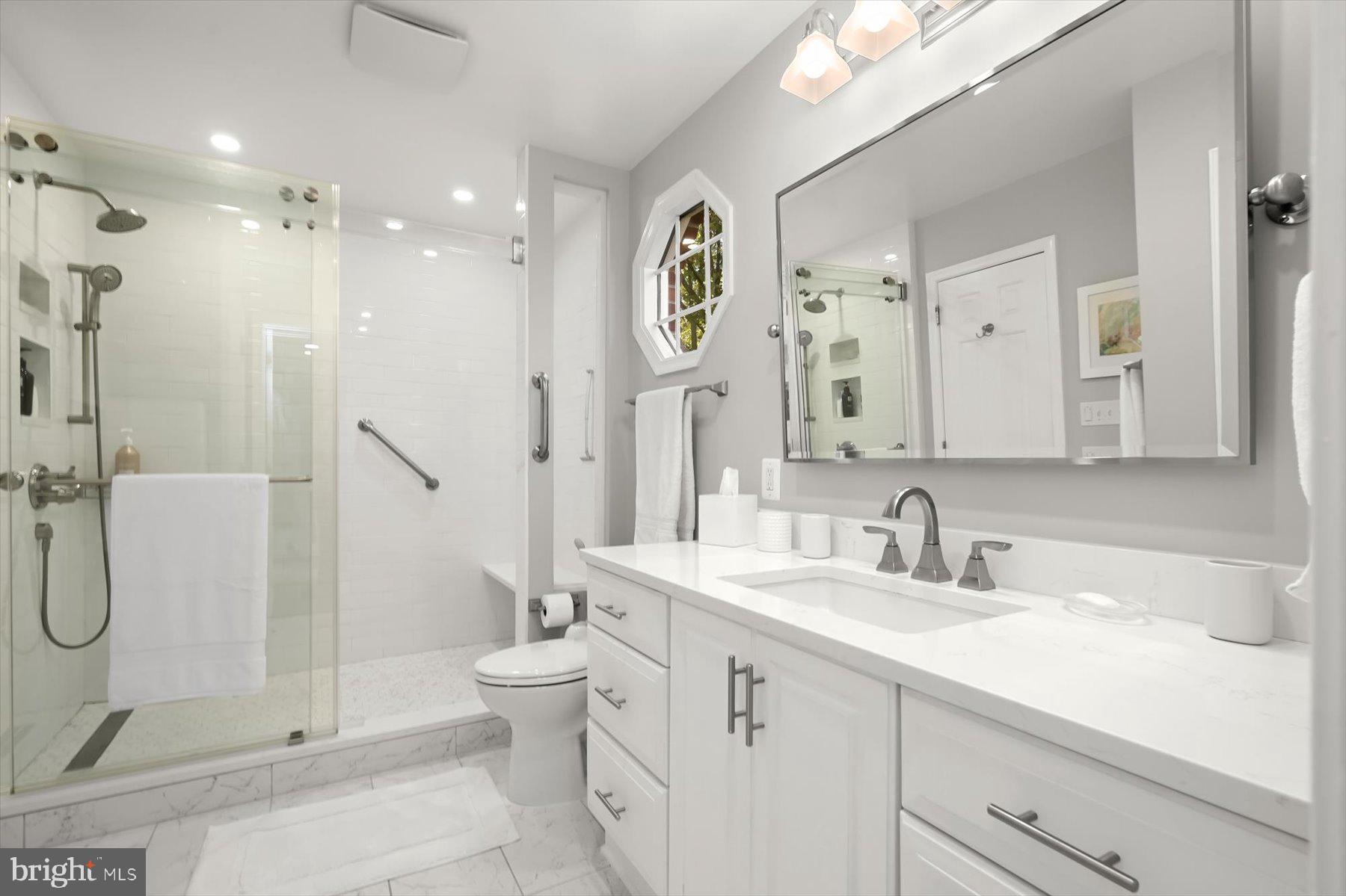 7828 Stable Way Potomac, MD 20854 - Photo 43 of 60 a bathroom with a sink toilet and shower