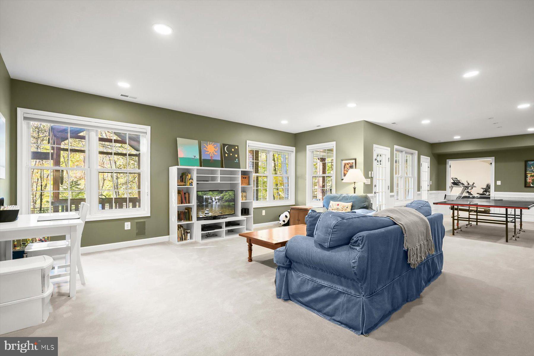 7828 Stable Way Potomac, MD 20854 - Photo 46 of 60 a living room with furniture and a flat screen tv