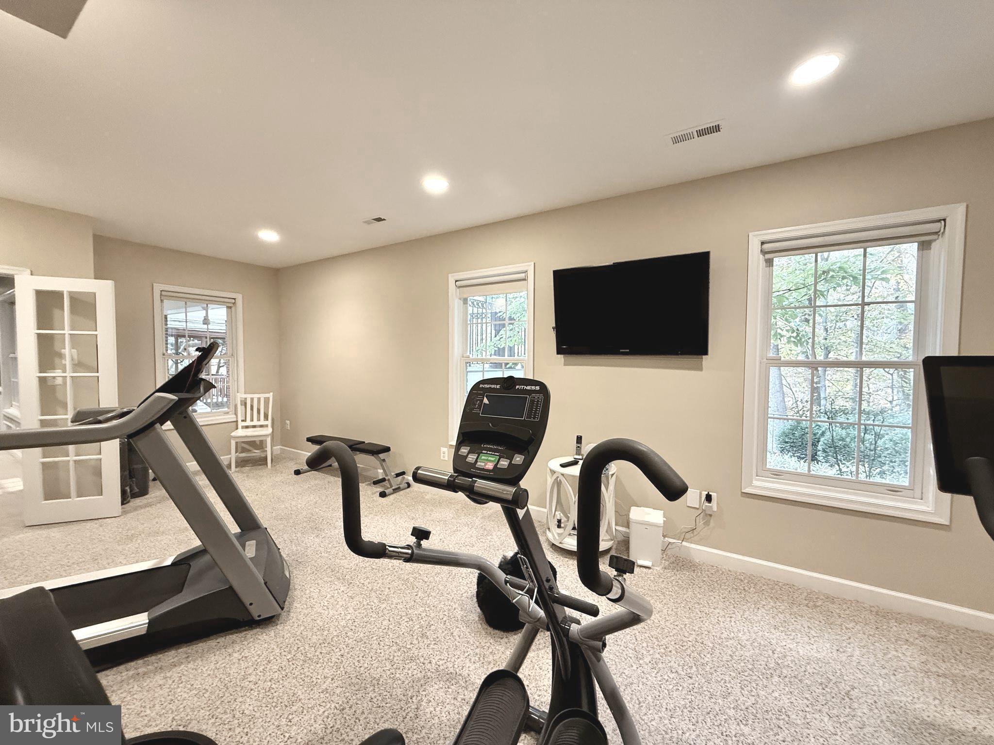 7828 Stable Way Potomac, MD 20854 - Photo 53 of 60 a view of a workspace with furniture and a window