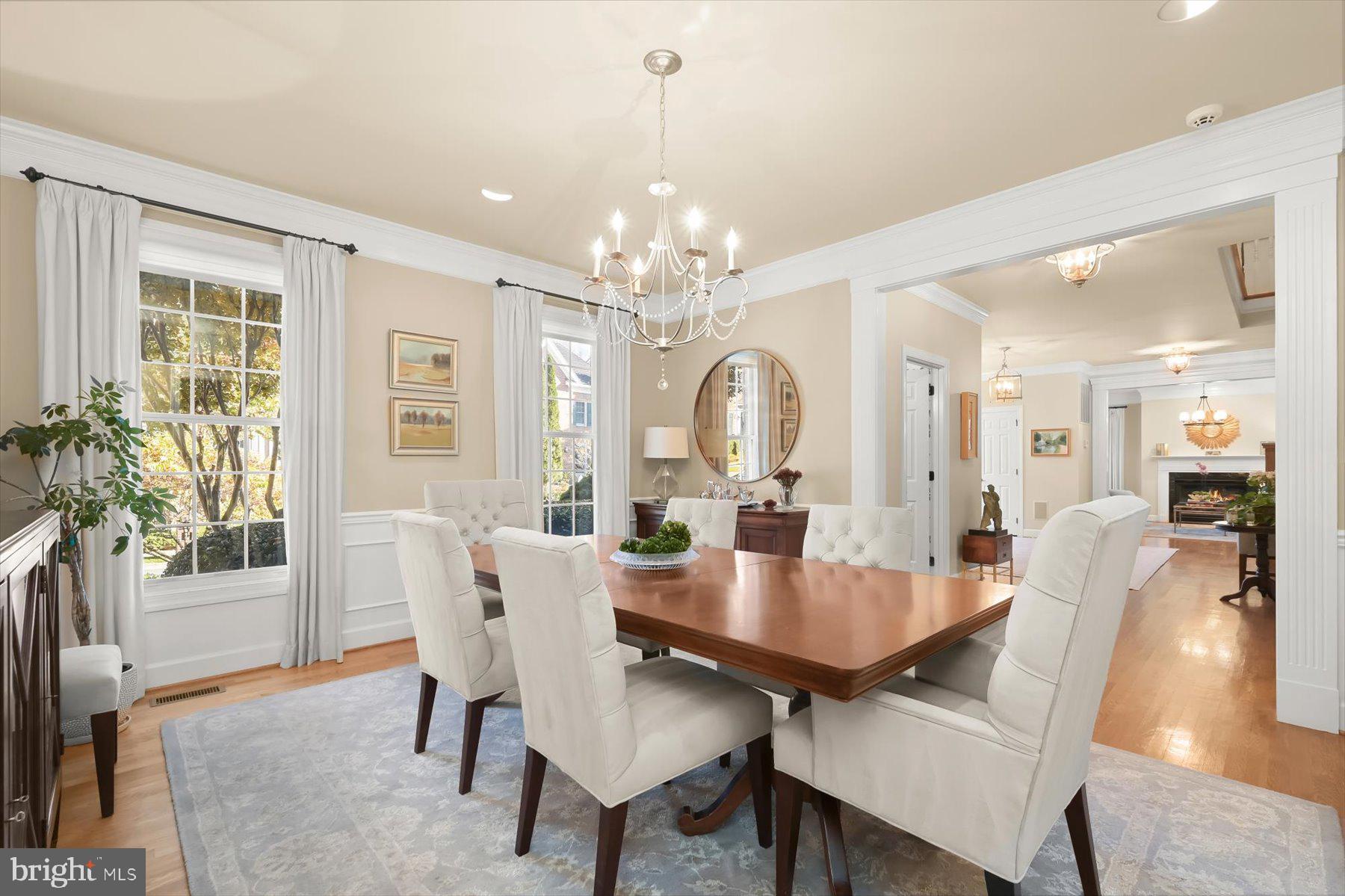 7828 Stable Way Potomac, MD 20854 - Photo 7 of 60 a view of a dining room with furniture window and wooden floor