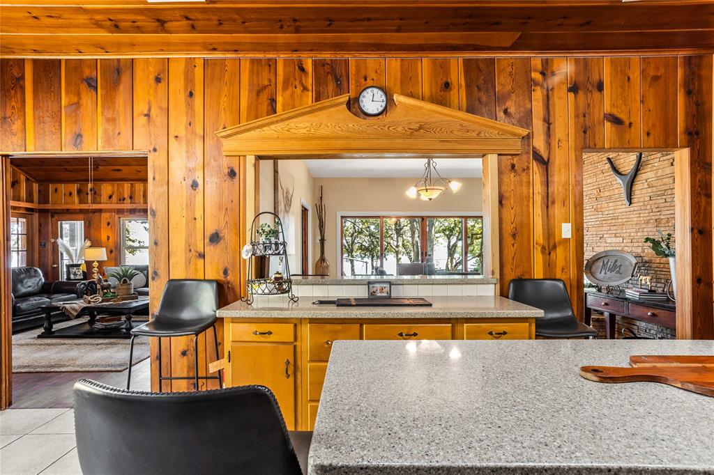 916 Kimbrough Road Azle, TX 76020 - Photo 15 of 40 a view of a living room and kitchen