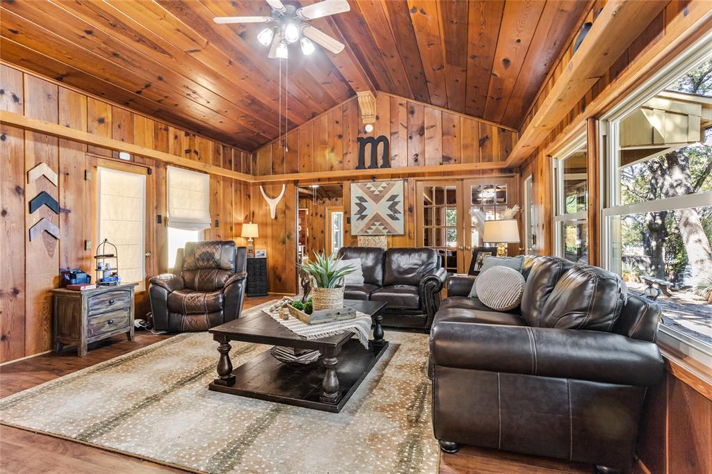 916 Kimbrough Road Azle, TX 76020 - Photo 20 of 40 a living room with furniture and a large window