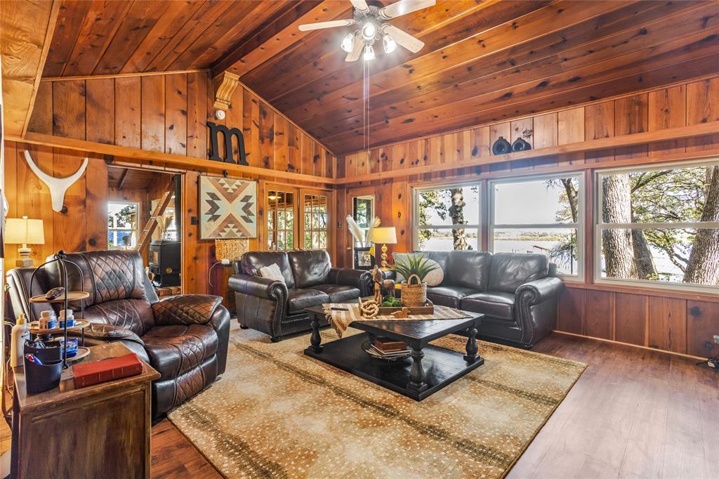 916 Kimbrough Road Azle, TX 76020 - Photo 21 of 40 a living room with furniture a couch and a window