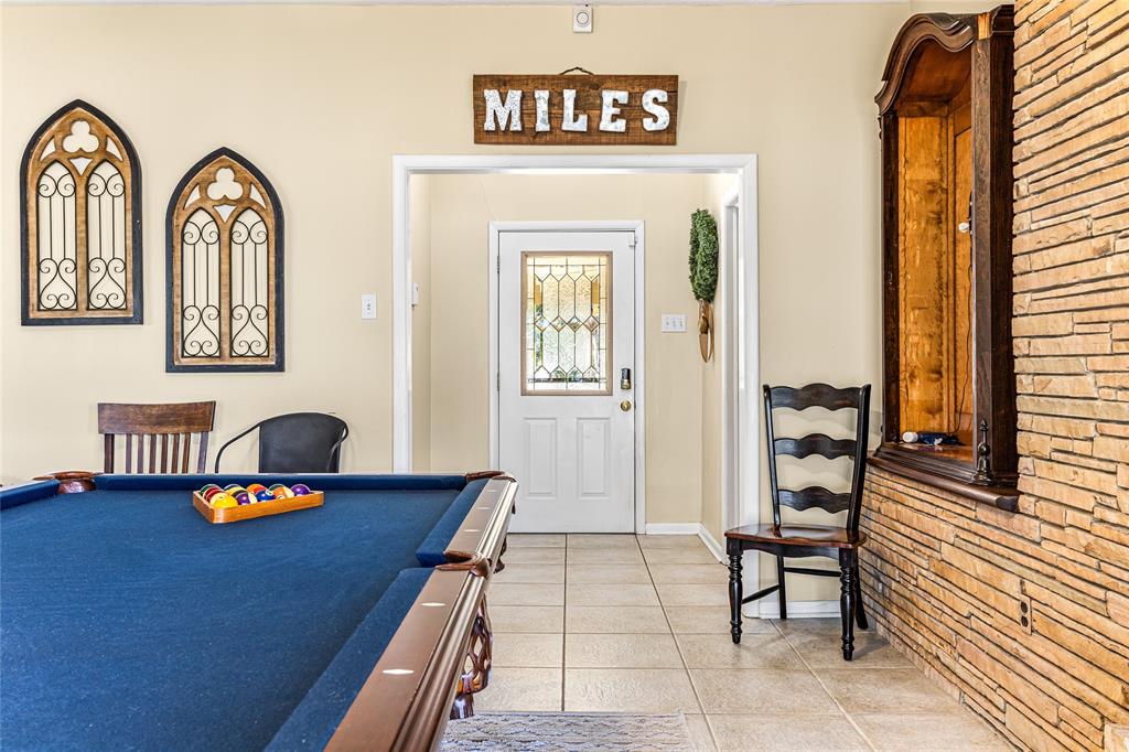 916 Kimbrough Road Azle, TX 76020 - Photo 6 of 40 a view of a livingroom with furniture and window
