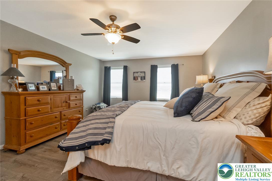 9461 Red Road Kempton, PA 19529 - Photo 25 of 55 Relax in this well-appointed sleeping sanctuary, complete with a ceiling fan for optimal comfort.