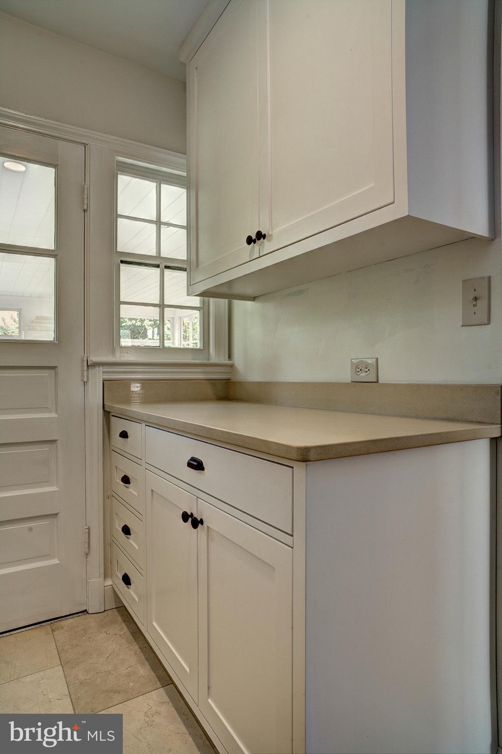 1723 Oakcrest Drive Alexandria, VA 22302 - Photo 16 of 17 a sink with white cabinets
