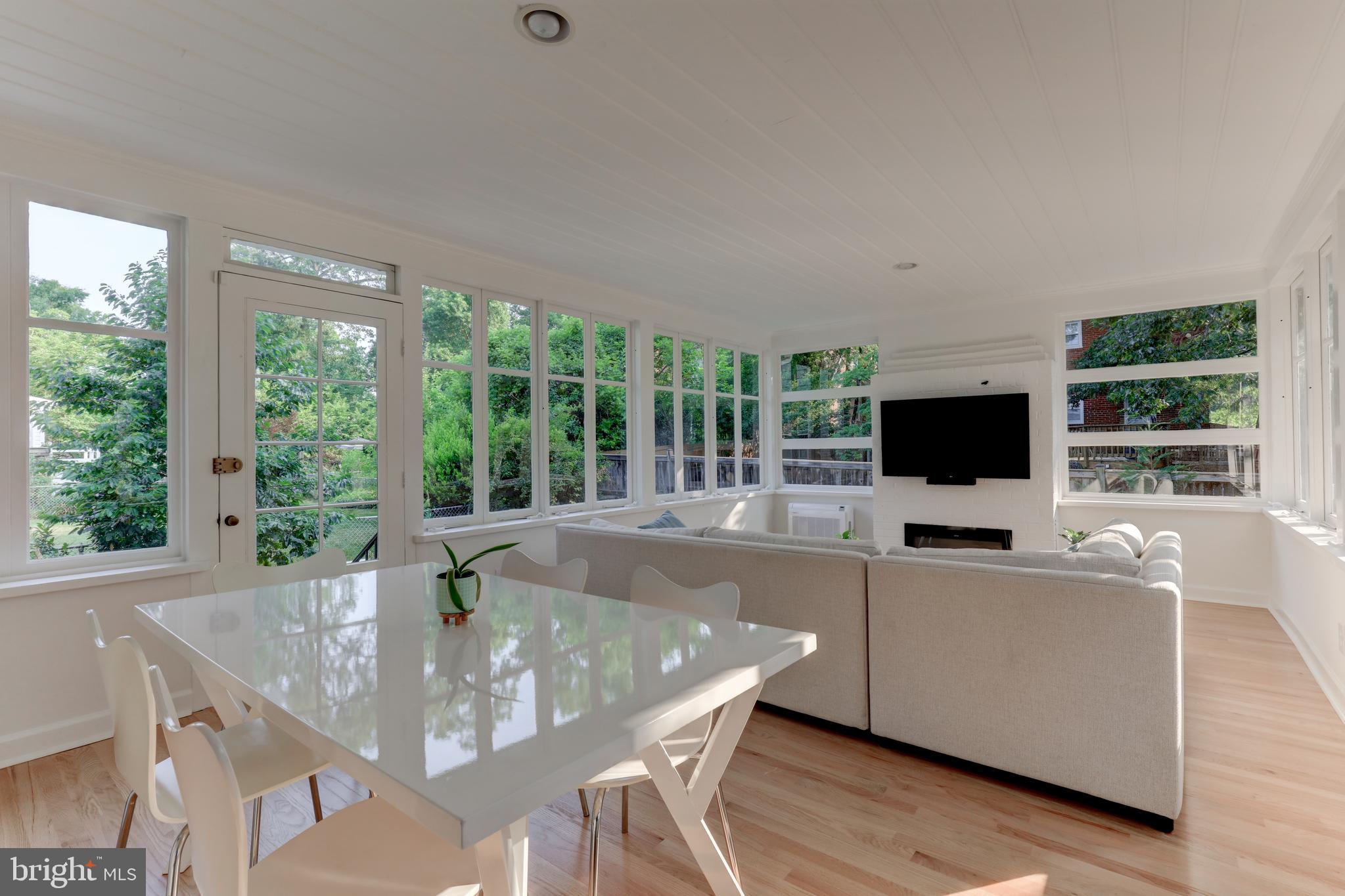 1723 Oakcrest Drive Alexandria, VA 22302 - Photo 4 of 17 a view of a dining room with furniture window and wooden floor