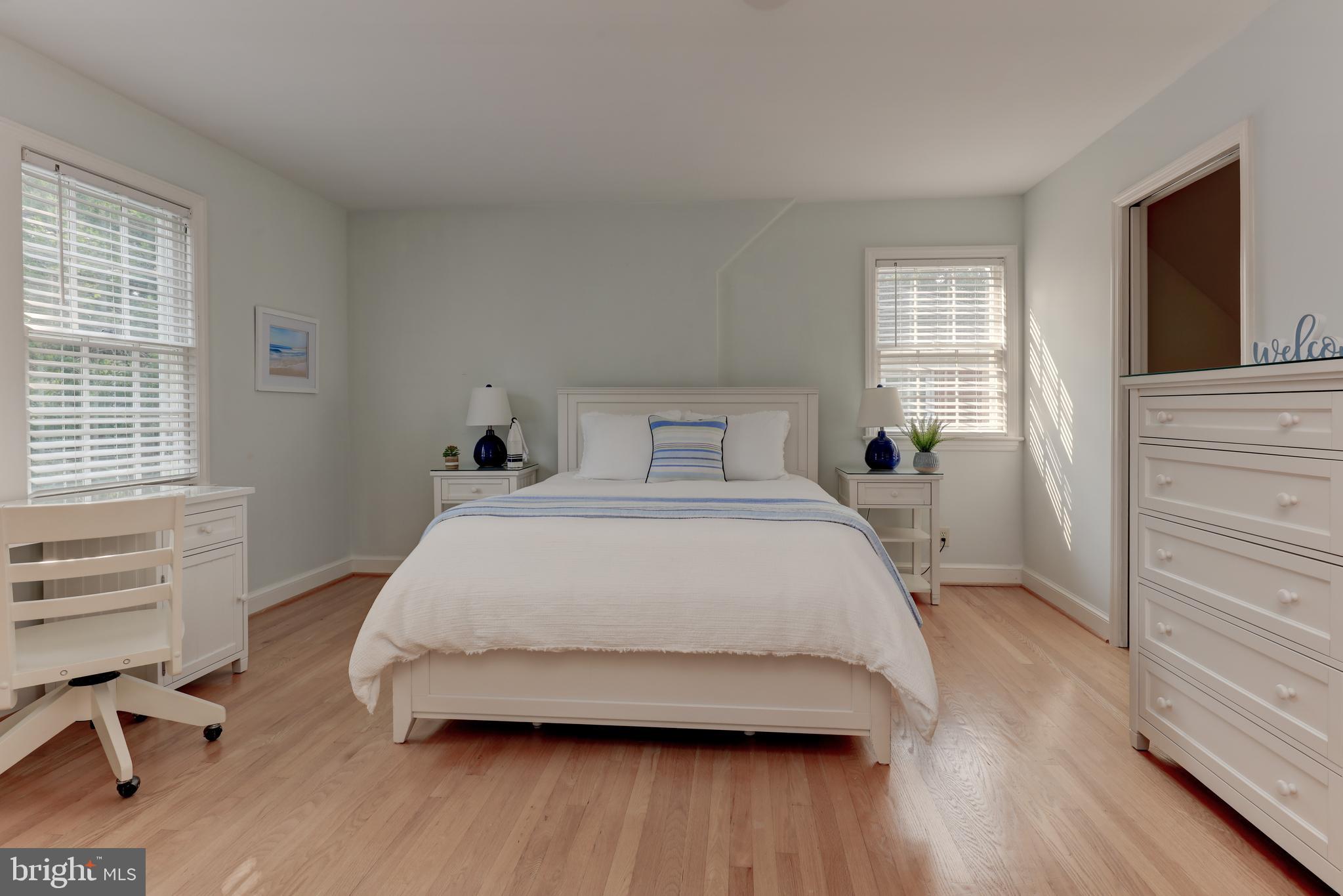 1723 Oakcrest Drive Alexandria, VA 22302 - Photo 10 of 17 a bedroom with a bed and a window