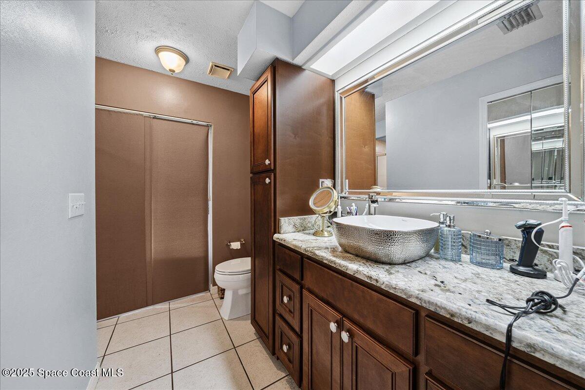 873 Ripley Terrace Northeast Palm Bay, FL 32907 - Photo 9 of 13 Primary Bathroom