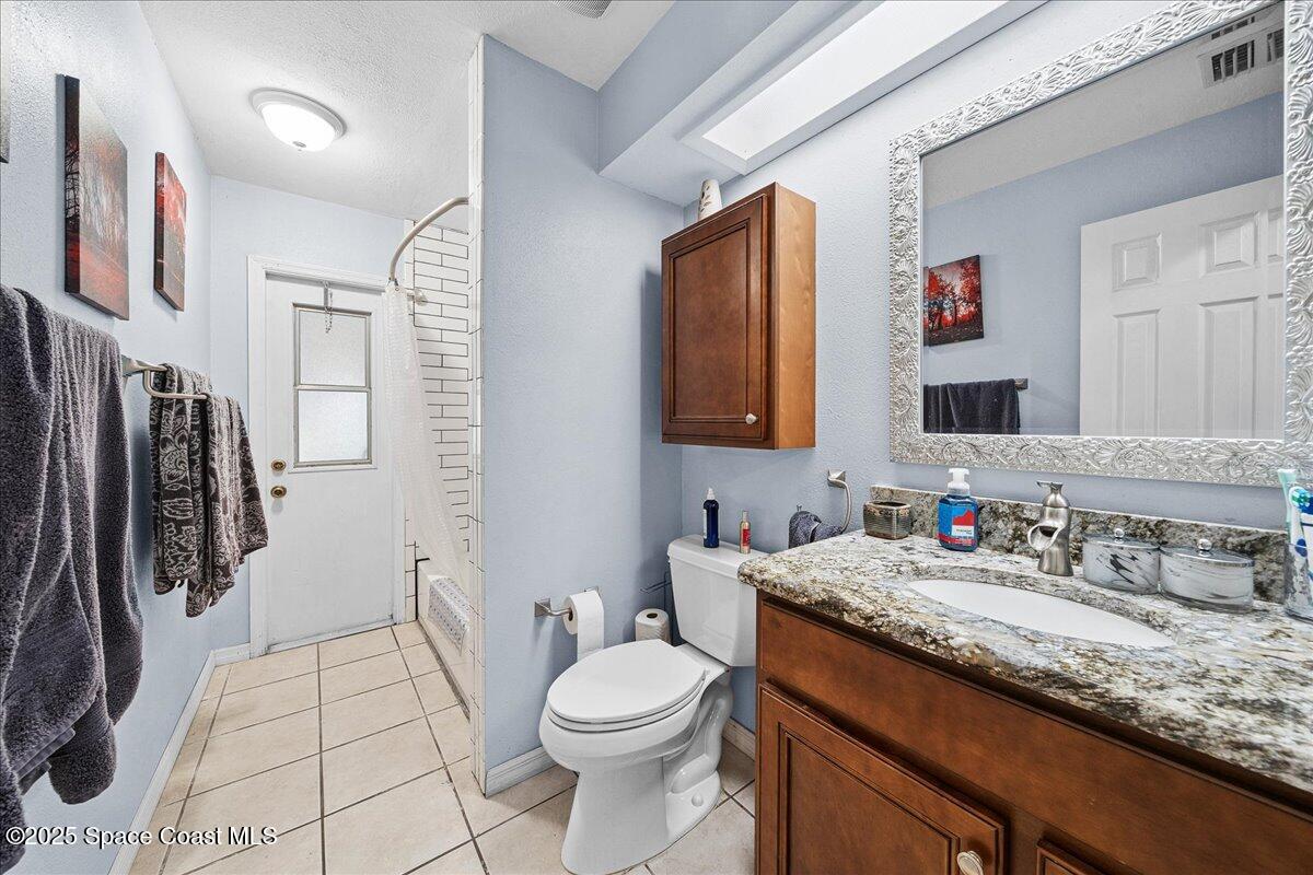 873 Ripley Terrace Northeast Palm Bay, FL 32907 - Photo 10 of 13 Guest Bathroom