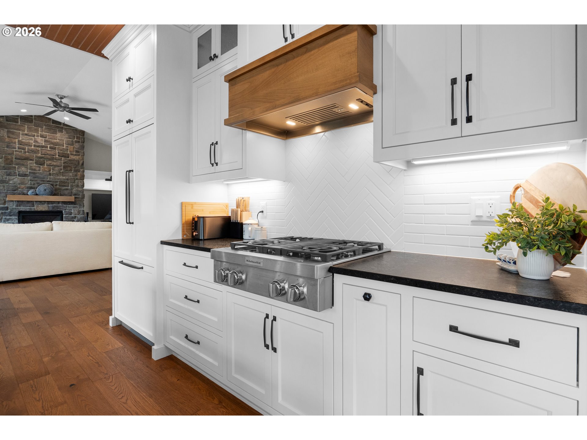 38590 Meadow Loop Nehalem, OR 97131 - Photo 19 of 48 a kitchen with white cabinets and appliances