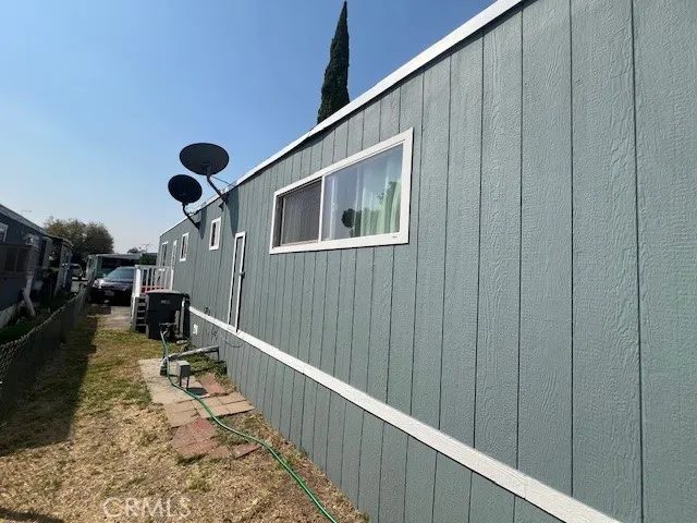 a view of backyard with cabin