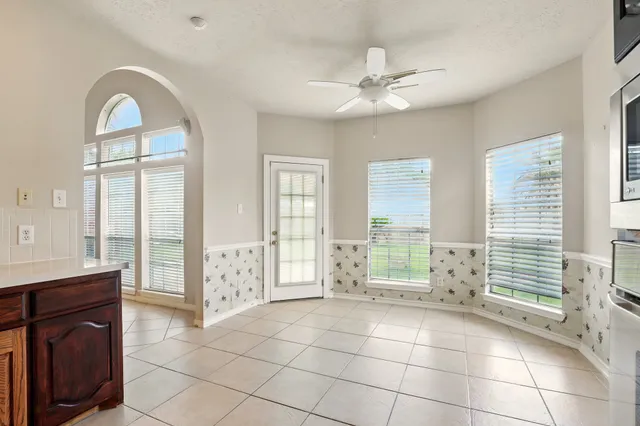 a view of a livingroom with a large window