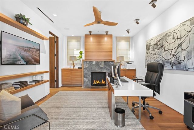 an aerial view of a house with a ocean view