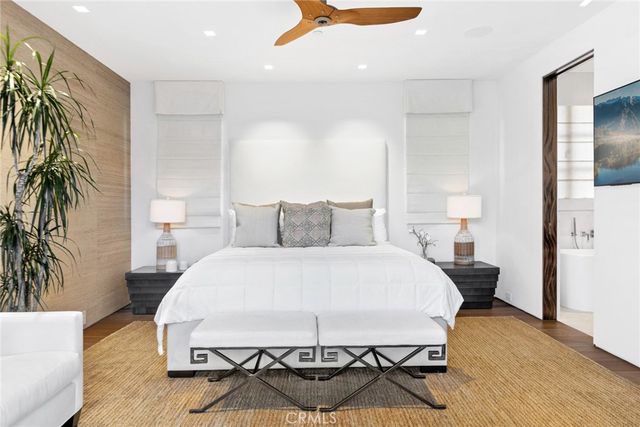 an aerial view of a house with a ocean view