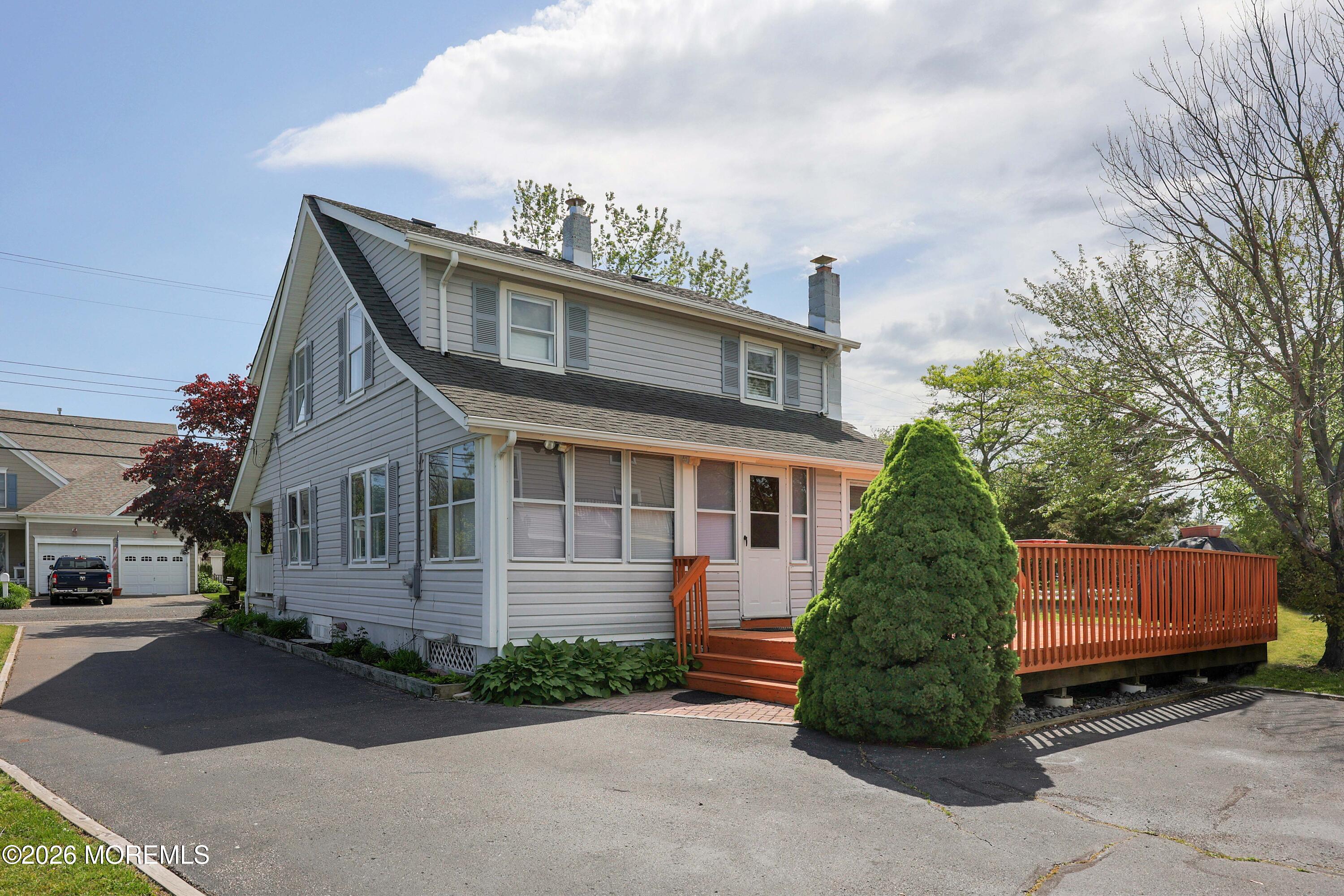 715 Howe Street Point Pleasant, NJ 08742 - Photo 28 of 45 a front view of a house with a yard