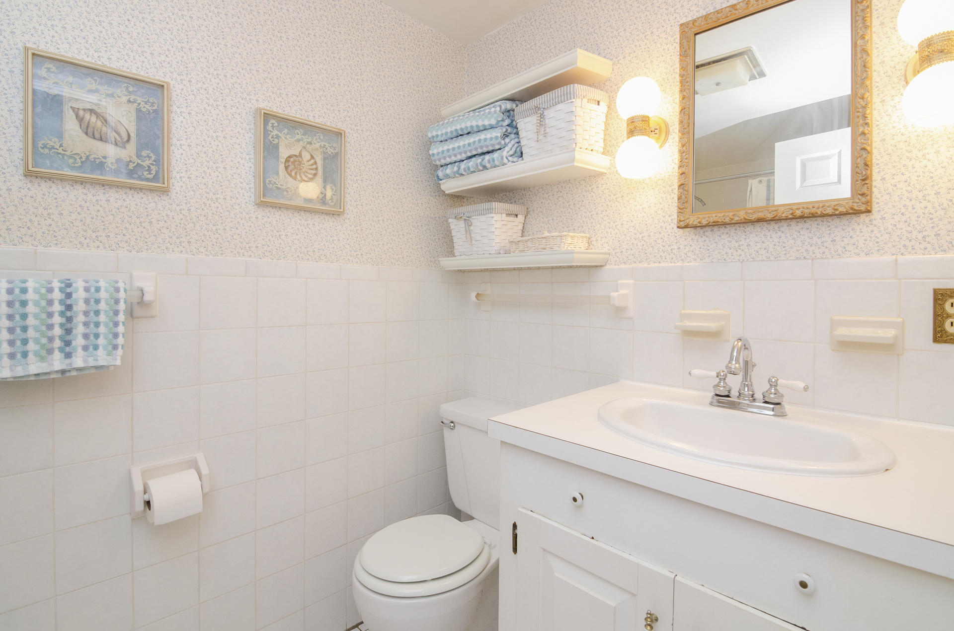 33 Fiddler Crab Lane Mashpee, MA 02649 - Photo 11 of 23 a bathroom with a toilet sink and mirror