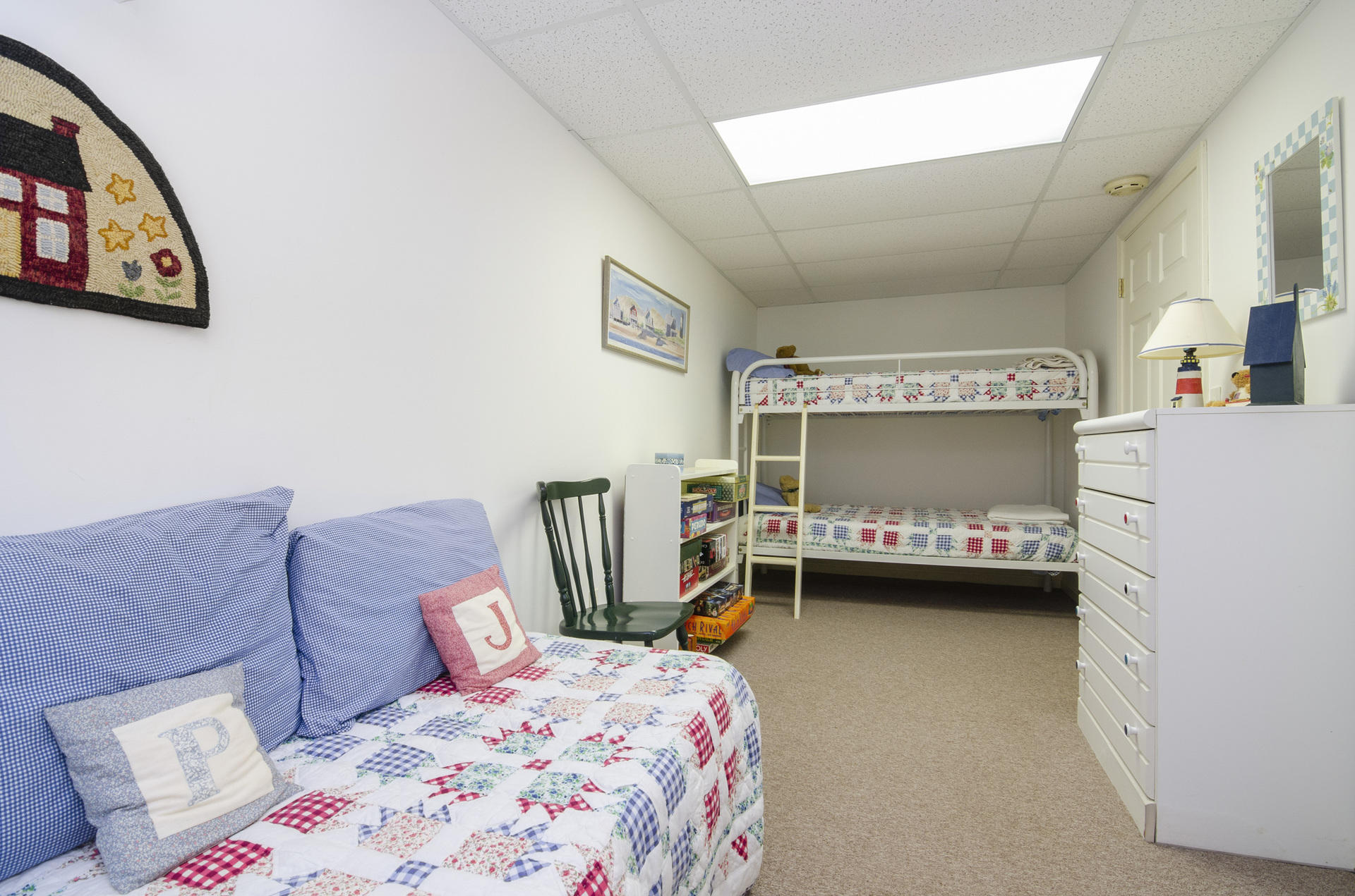 33 Fiddler Crab Lane Mashpee, MA 02649 - Photo 15 of 23 a bedroom with a bed and a chair