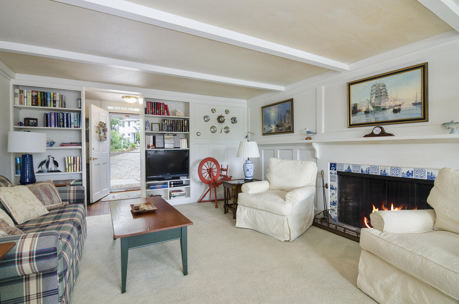 33 Fiddler Crab Lane Mashpee, MA 02649 - Photo 2 of 23 a living room with furniture and a fireplace