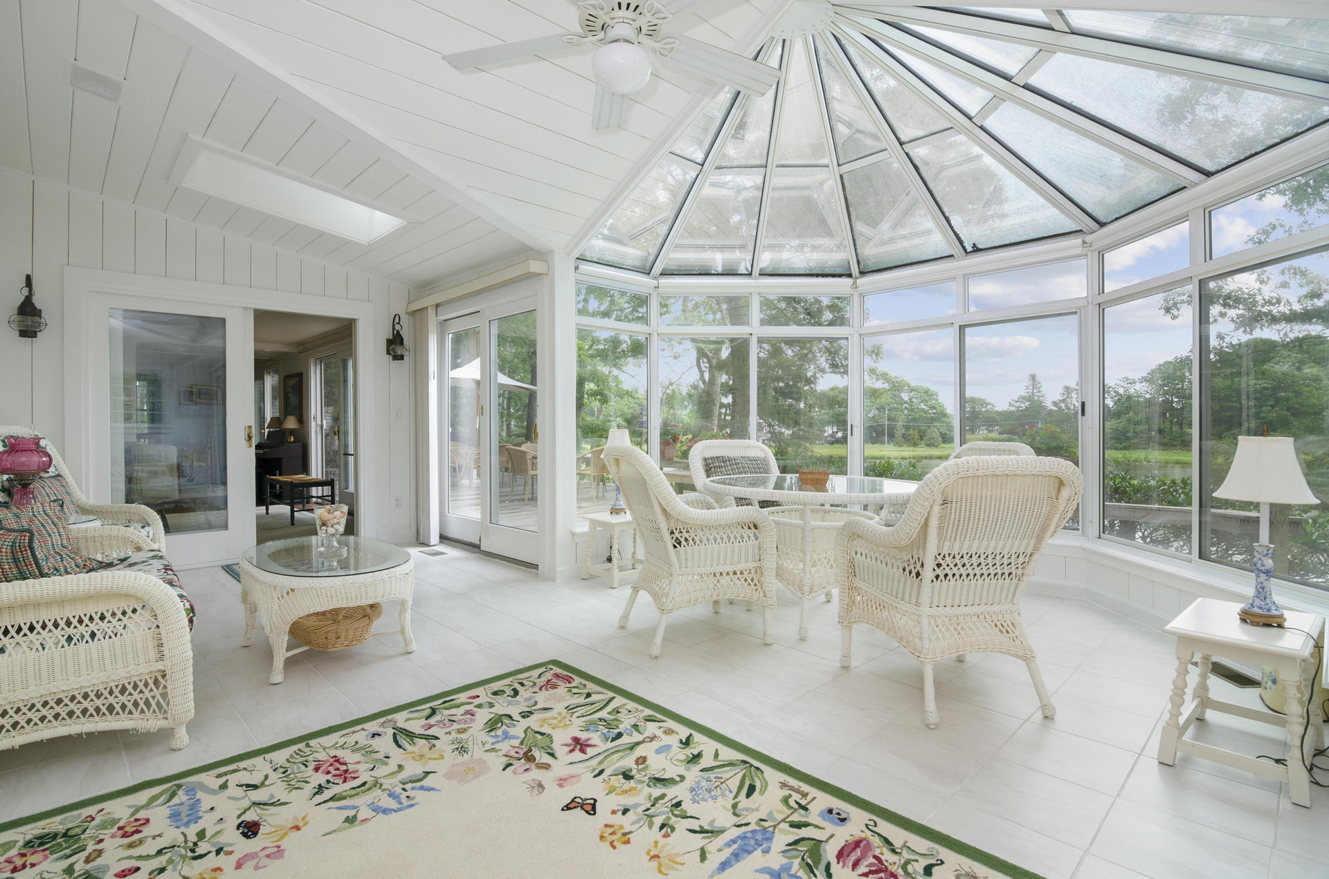 33 Fiddler Crab Lane Mashpee, MA 02649 - Photo 7 of 23 a dining room with furniture a rug and a large window