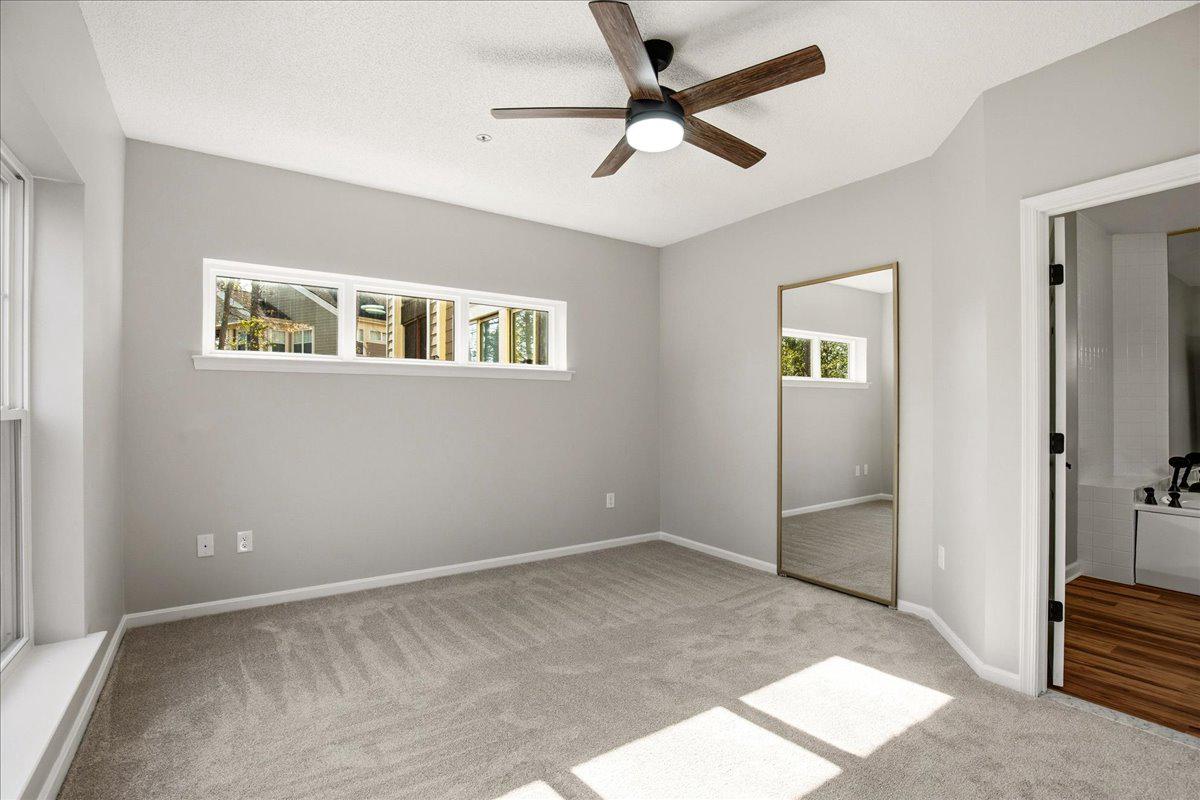 1223 Back Creek Loop, Unit 1223 Solomons, MD 20688 - Photo 21 of 44 a view of livingroom with hardwood floor and a ceiling fan