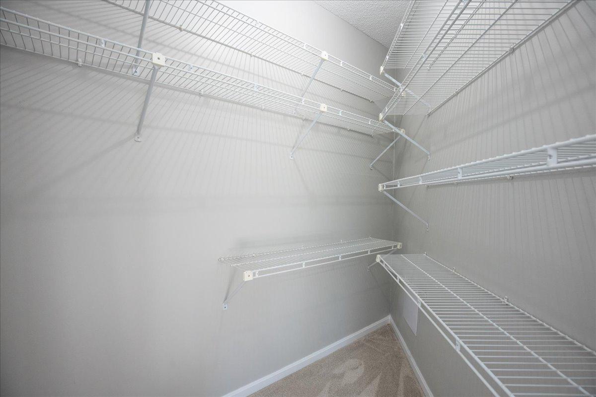 1223 Back Creek Loop, Unit 1223 Solomons, MD 20688 - Photo 27 of 44 a view of a room with racks on the wall