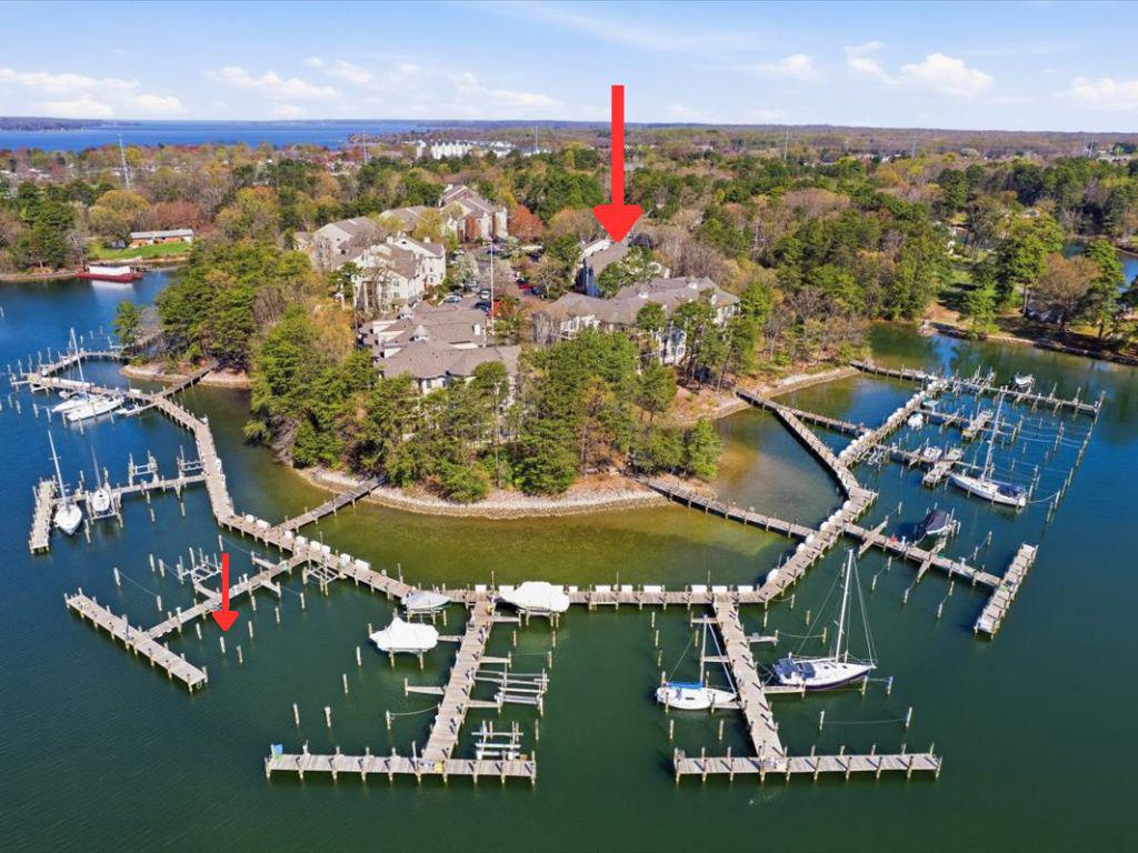 1223 Back Creek Loop, Unit 1223 Solomons, MD 20688 - Photo 1 of 44 an aerial view of a house with a yard lake view and mountain view