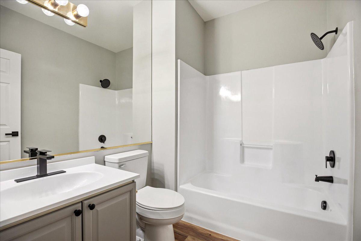 1223 Back Creek Loop, Unit 1223 Solomons, MD 20688 - Photo 28 of 44 a bathroom with a sink toilet and shower