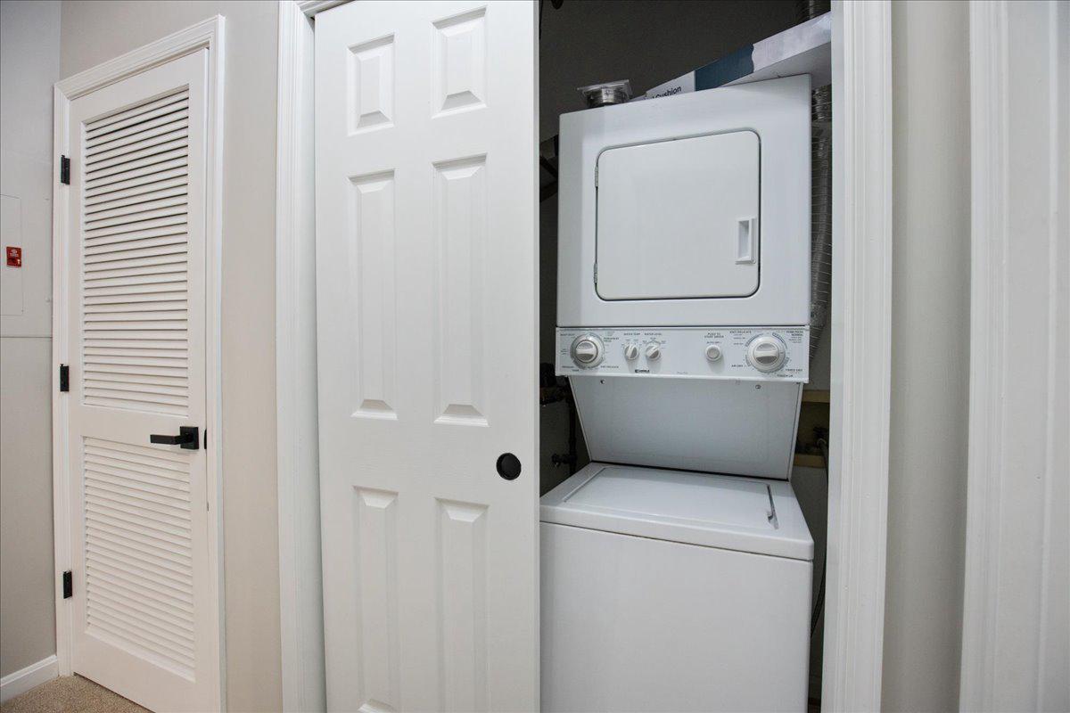 1223 Back Creek Loop, Unit 1223 Solomons, MD 20688 - Photo 29 of 44 a utility room with dryer and washer
