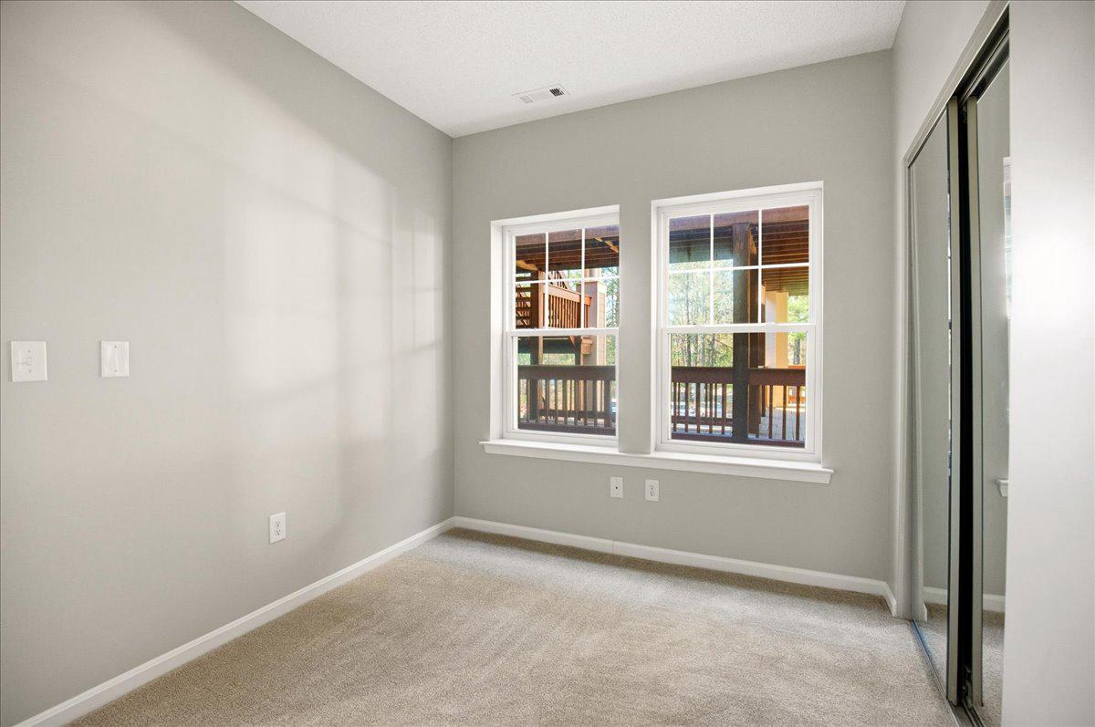 1223 Back Creek Loop, Unit 1223 Solomons, MD 20688 - Photo 31 of 44 an empty room with a window