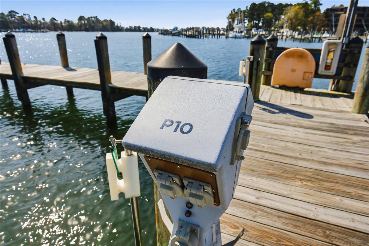 1223 Back Creek Loop, Unit 1223 Solomons, MD 20688 - Photo 39 of 44 a view of a chairs and table in the balcony
