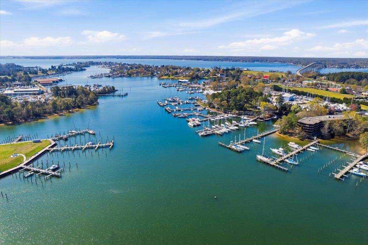 1223 Back Creek Loop, Unit 1223 Solomons, MD 20688 - Photo 4 of 44 an aerial view of a house with a lake view