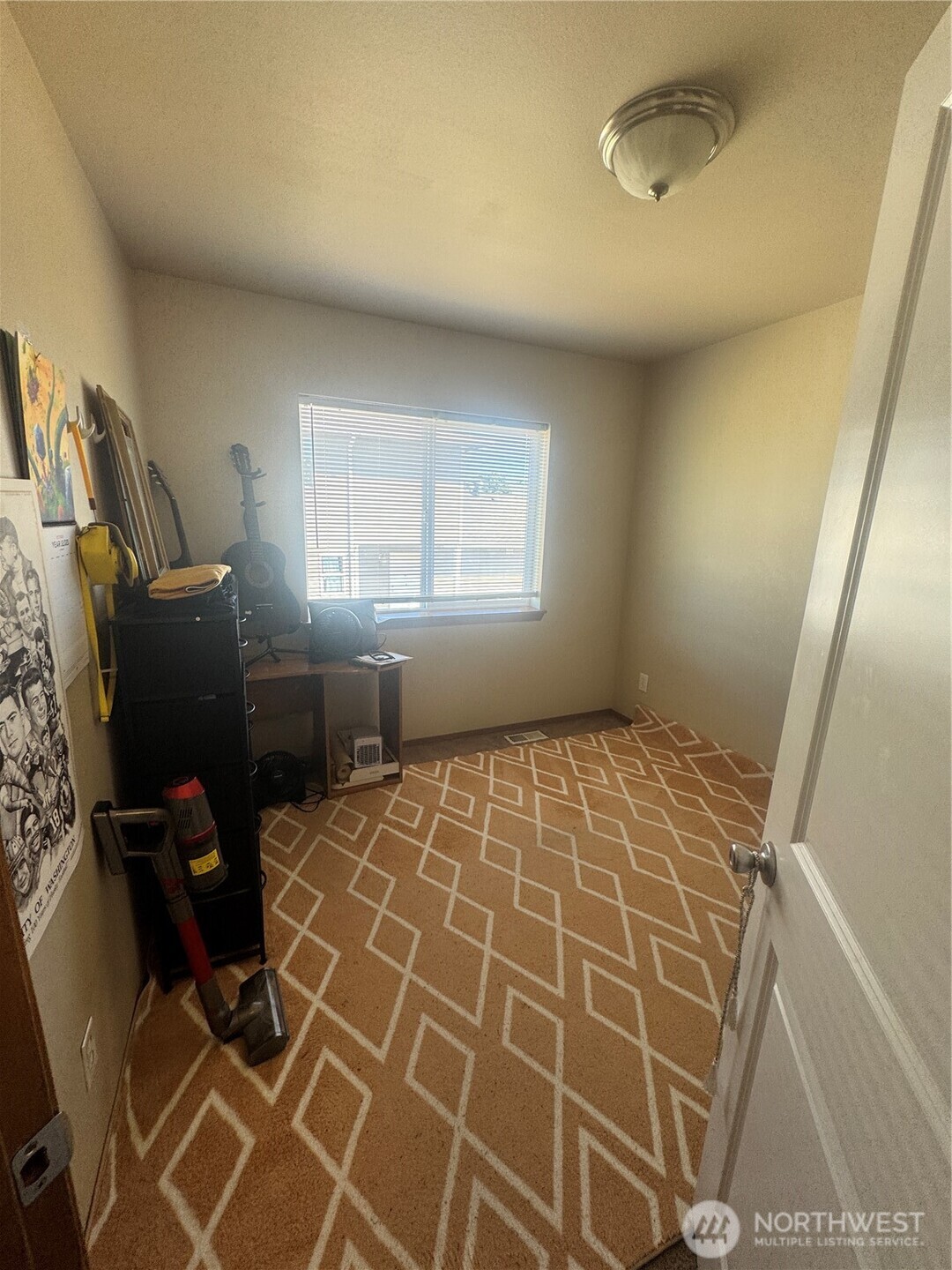 2905 11th Street, Unit AD Everett, WA 98201 - Photo 11 of 17 a bedroom with a bed and a window