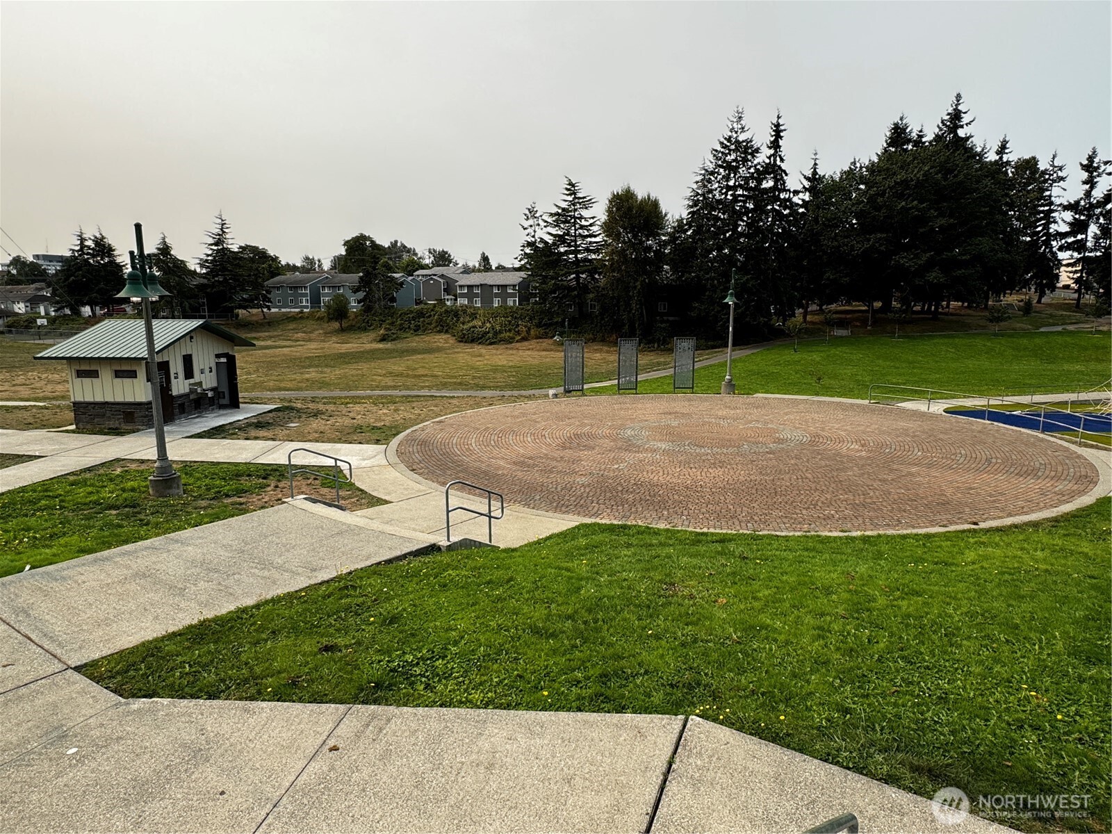 2905 11th Street, Unit AD Everett, WA 98201 - Photo 15 of 17 a view of a lake with a yard