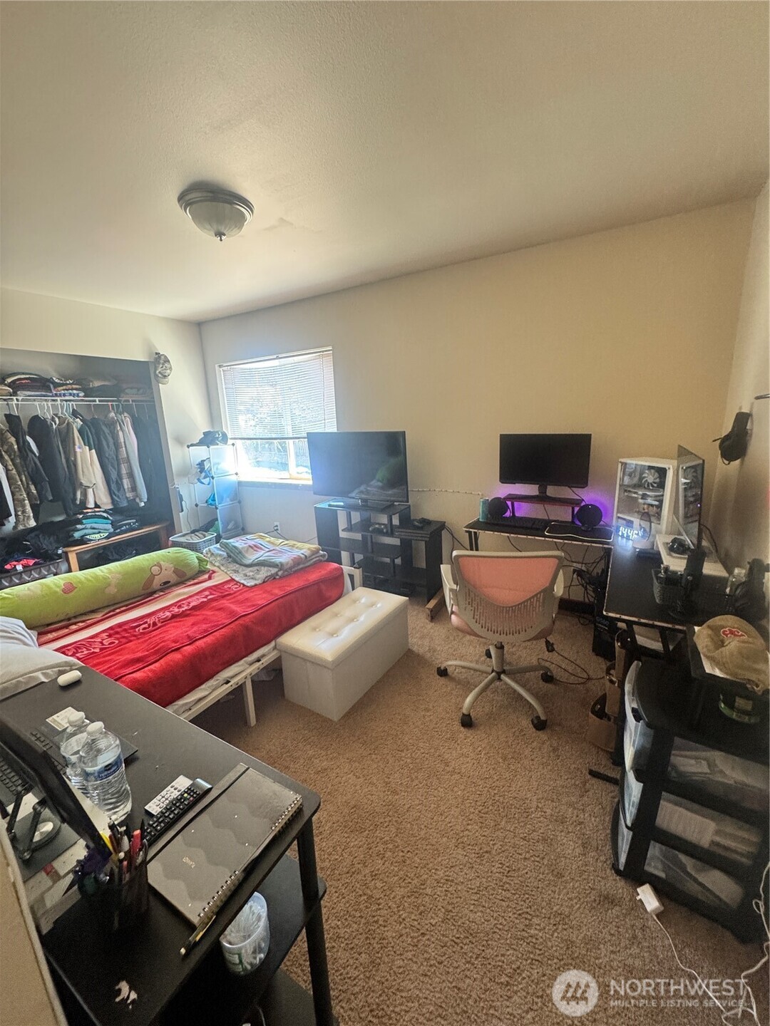 2905 11th Street, Unit AD Everett, WA 98201 - Photo 9 of 17 a bedroom with a bed and a desk