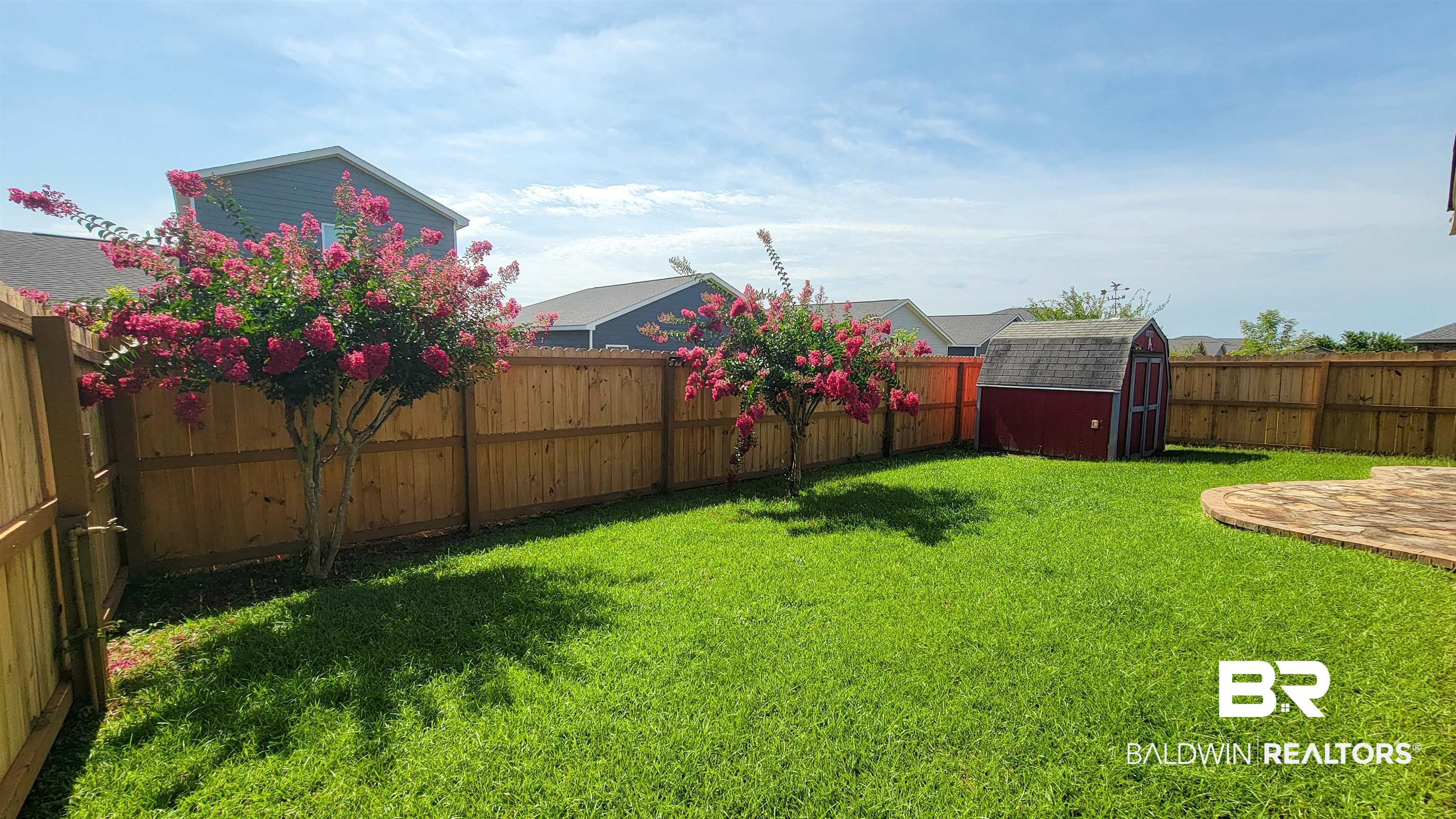 1704 Arcadia Drive Foley, AL 36535 - Photo 44 of 52 Fenced backyard with a storage unit