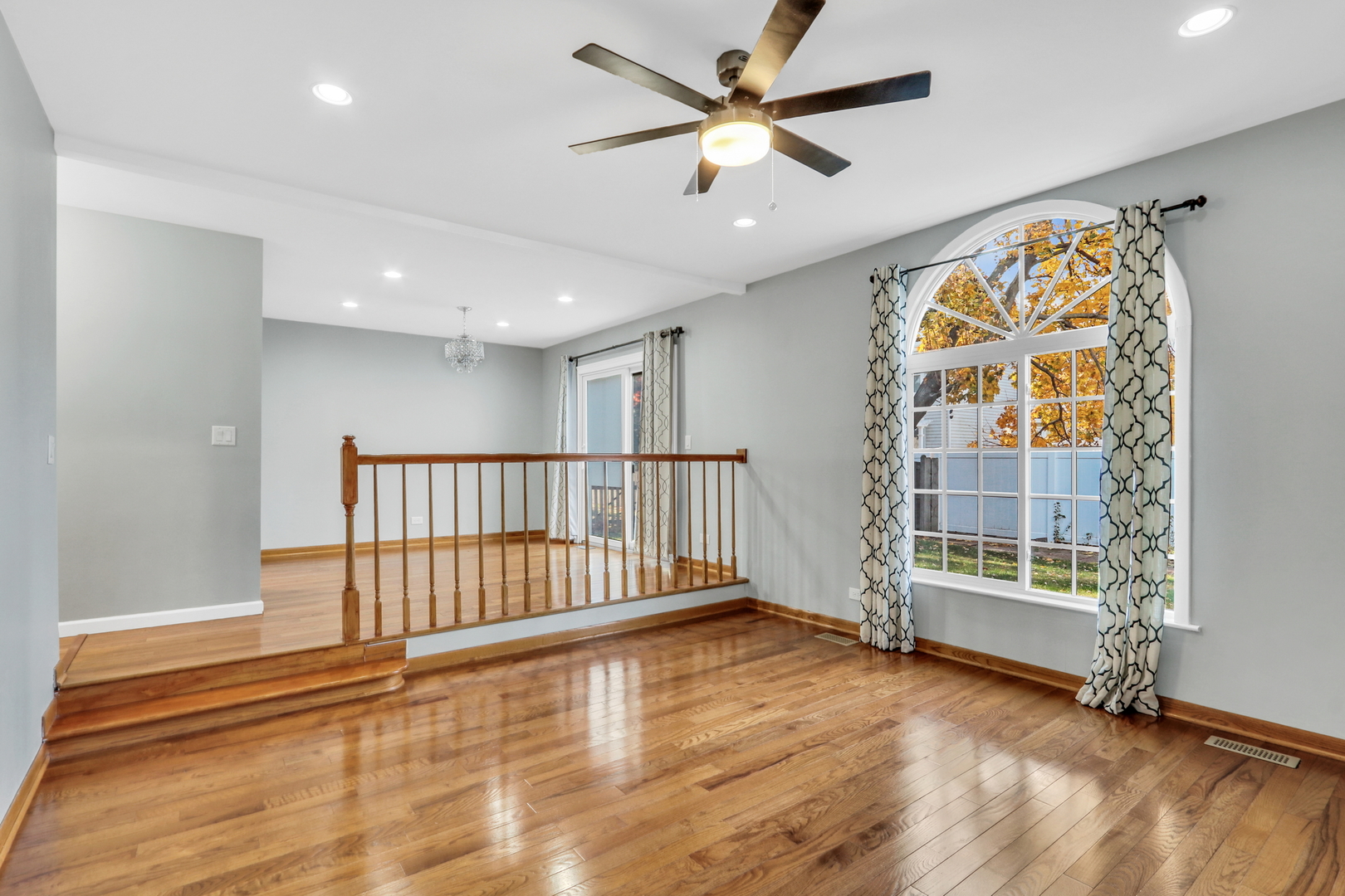 5315 Cypress Circle Gurnee, IL 60031 - Photo 13 of 31 wooden floor in an empty room with a window