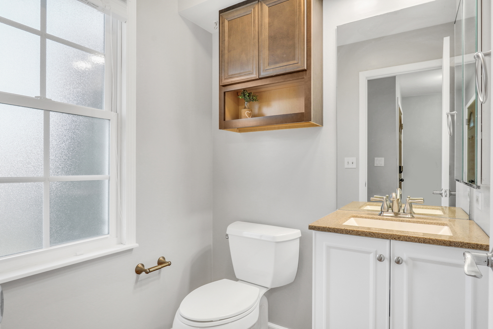 5315 Cypress Circle Gurnee, IL 60031 - Photo 15 of 31 a bathroom with a toilet a sink and a mirror