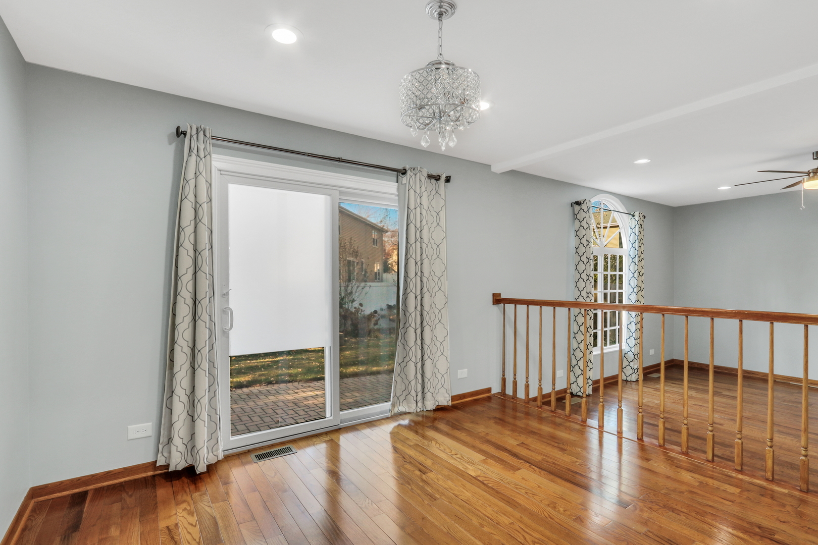 5315 Cypress Circle Gurnee, IL 60031 - Photo 10 of 31 a view of livingroom with hardwood floor and window
