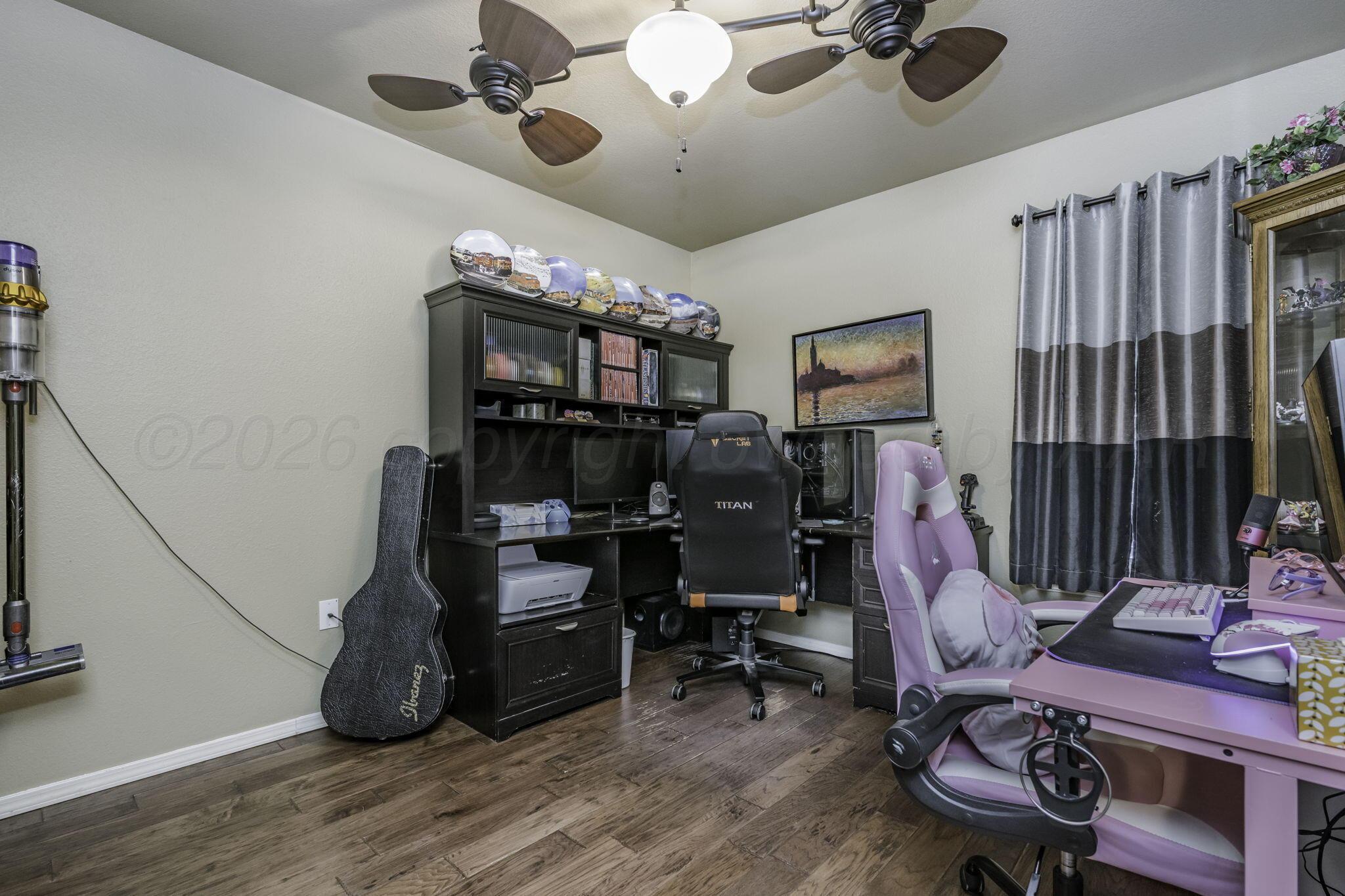 3504 Springfield Avenue Amarillo, TX 79118 - Photo 17 of 23 a view of a room with gym equipment