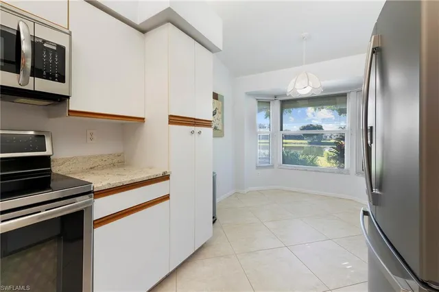 $345,000 | 3340 Erick Lake Drive, Unit 2004, Naples, FL 34109