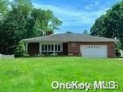 70 Washington Drive Centerport, NY 11721 - Photo 1 of 1 a view of a house with a yard