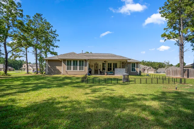 a view of a chair and tables in the patio