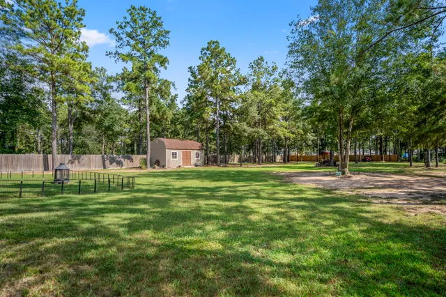 a view of a park with swings and slides