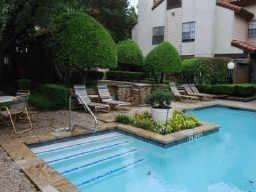 5626 Preston Oaks Road, Unit 39C Dallas, TX 75254 - Photo 22 of 38 Community pool featuring a patio area