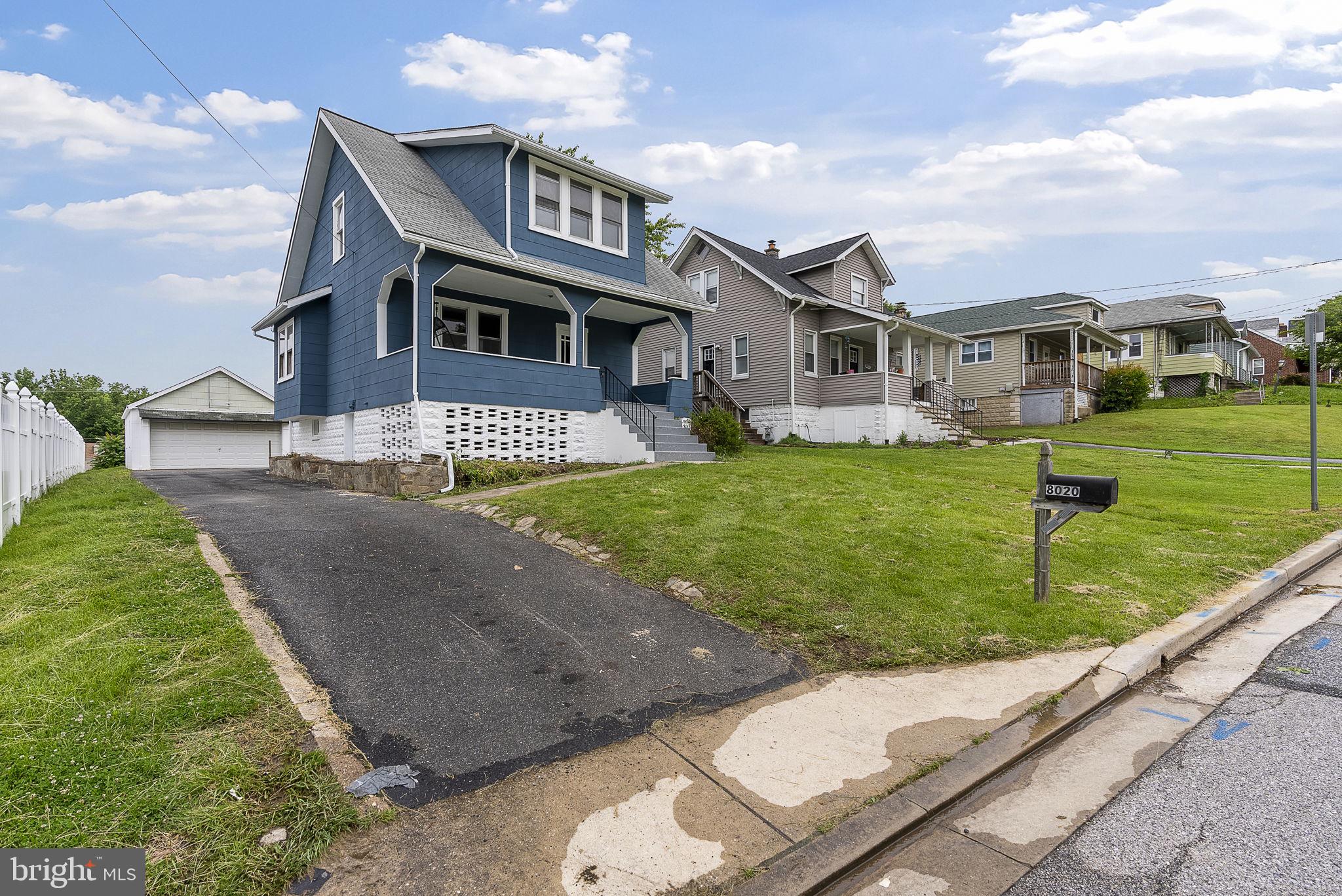 8020 Old Philadelphia Road Baltimore, MD 21237 - Photo 2 of 37 a front view of house with yard and green space