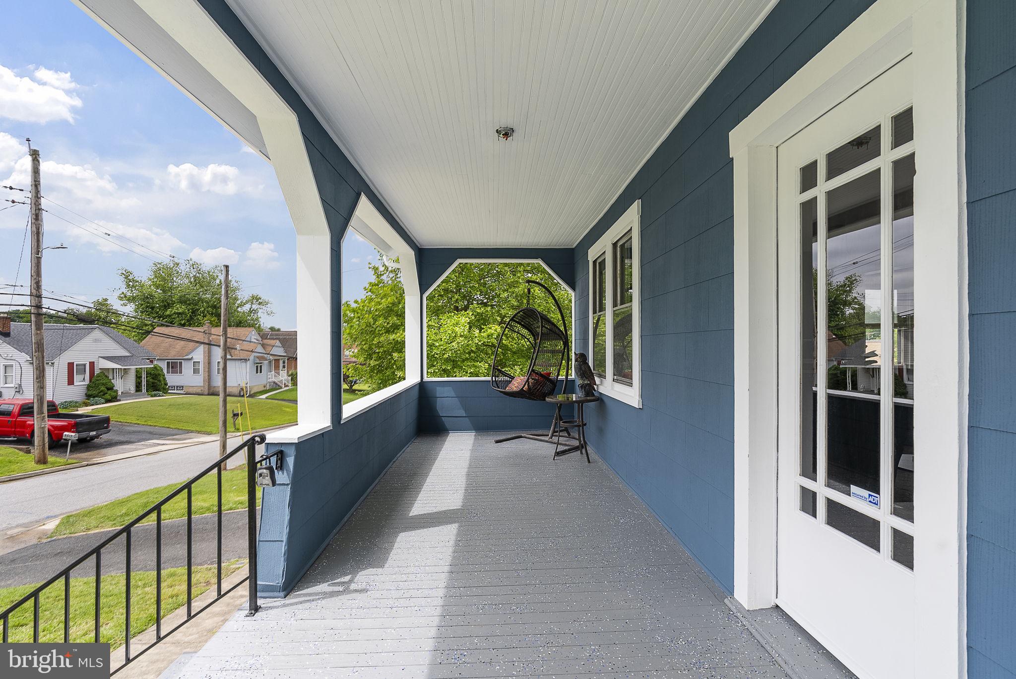 8020 Old Philadelphia Road Baltimore, MD 21237 - Photo 3 of 37 a view of a house with porch and wooden floor