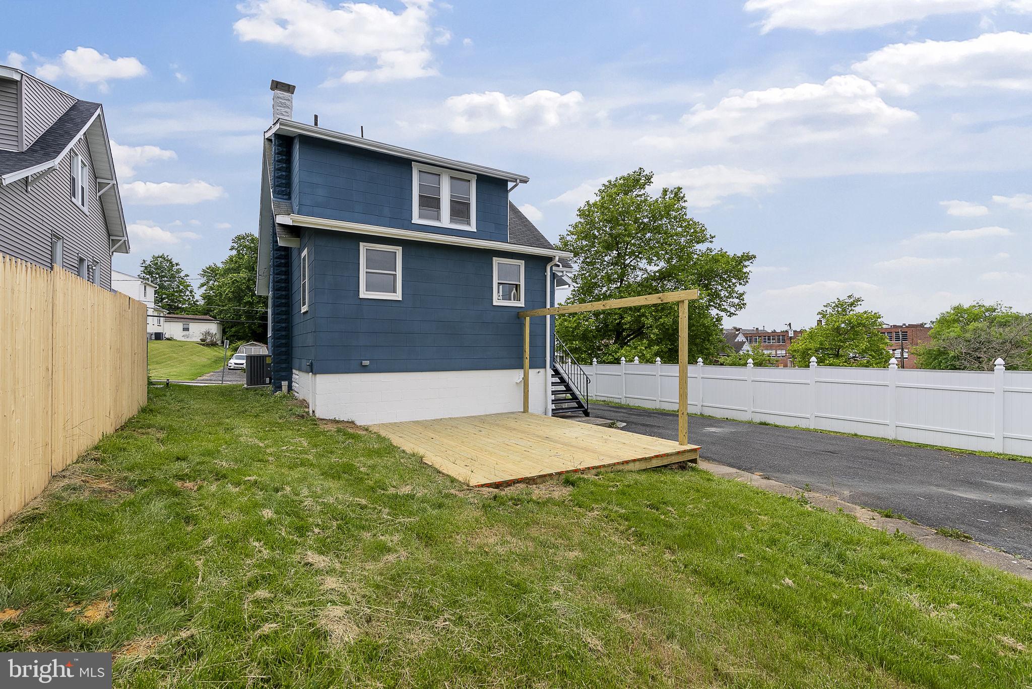 8020 Old Philadelphia Road Baltimore, MD 21237 - Photo 34 of 37 a view of a yard in front of a house
