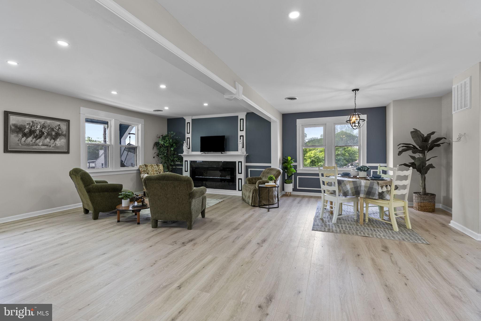 8020 Old Philadelphia Road Baltimore, MD 21237 - Photo 8 of 37 a living room with furniture and a wooden floor